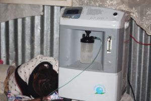 Joyce Wangechi hooked on an oxygen concentrator